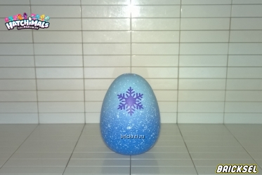 Яйцо сине-голубое с фиолетовой снежинкой (внутри фигурка)